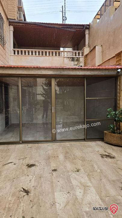 شقة شبه ارضية مساحة 200م داخلي و 100م خارجي للايجار في عمان - خلدا 