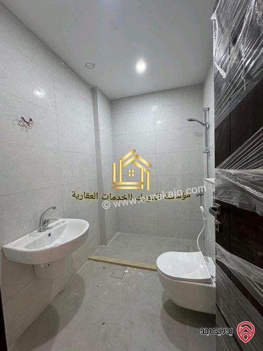 شقة جديدة لم تسكن طابق ارضي مساحة 125م للإيجار في عمان - مرج الحمام 