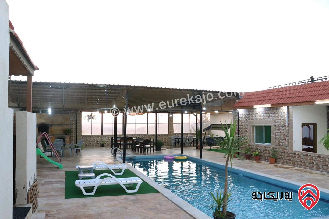 مزرعة مساحة الأرض 2 دونم و 500م والبناء 250م للبيع من أراضي شمال عمان - موبص