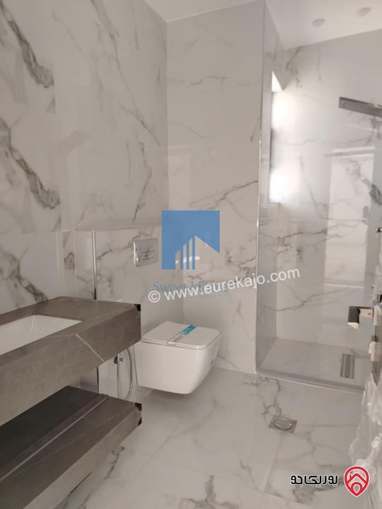 شقة فاخرة للبيع في عمان خلدا  - خلف المستشفى السعودي ومقابل ميداس طابق ثاني 217م لم تسكن بسعر مغري