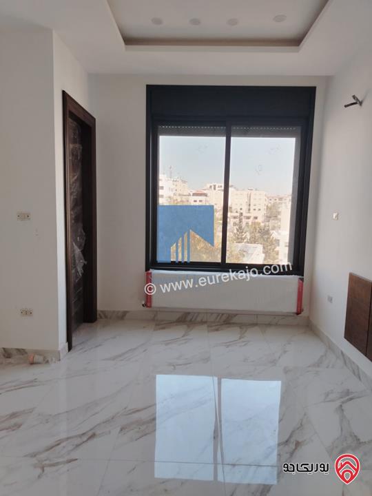 شقة فاخرة للبيع في عمان خلدا  - خلف المستشفى السعودي ومقابل ميداس طابق ثاني 217م لم تسكن بسعر مغري