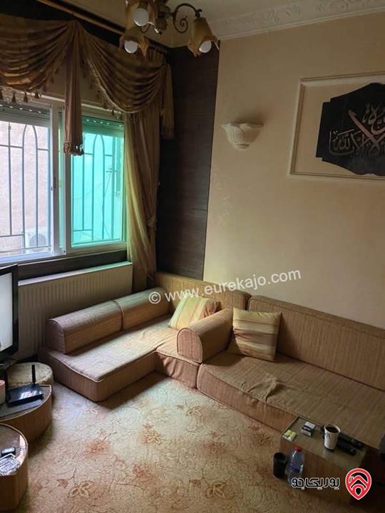 شقة للبيع في عمان- تلاع العلي قرب دوار الواحة طابق ارضي مساحة 120م + 35م