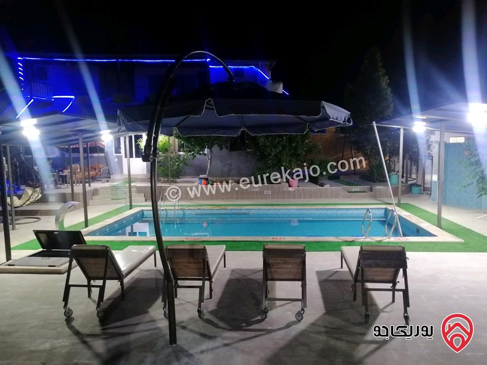 مزرعة ومنتجع مساحة الأرض 3 دونم و 700م والبناء 250م للبيع في اربد - كفر سوم قوشان مستقل استثمارية وسكنية