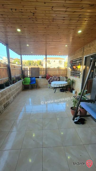 شقة أرضية مساحة 140م داخلي و 32م ترس للبيع في عمان - طبربور 