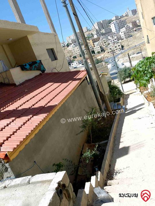 بيت مساحة 186م على أرض 309م للبيع في عمان - اسكان صالحية العابد البيت ع درج وليس شارع 