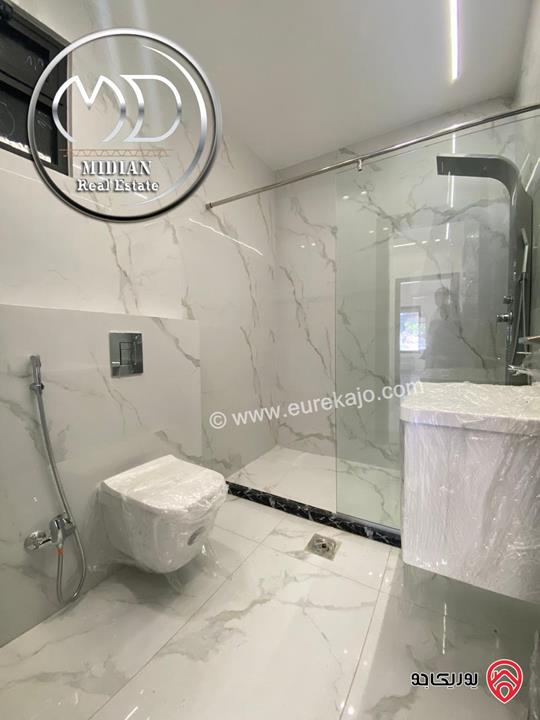 شقة ارضية جديدة فارغة للايجار في عمان - ضاحية الرشيد مساحة 180م مع ترس 30م تشطيبات ديكورات سوبر ديلوكس