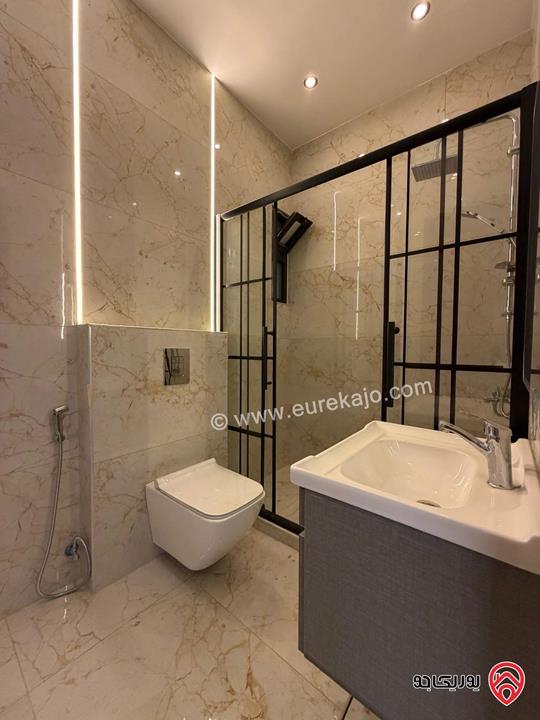 شقة سوبر ديلوكس شبه ارضي دوبلكس مساحة 228م مع ترس 40م للبيع في عمان - مرج الحمام 