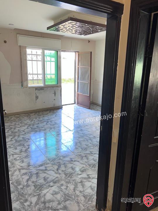 شقة شبه أرضية مساحة 100م داخلي و 100م خارجي للبيع في عمان - الجبيهة 