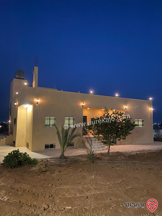مزرعة مساحة 10 دونم مشجرة زيتون مع بيت مساحة 200م وسكن حارس وسور على كامل المزرعة للبيع في عمان - منطقة زويزا 