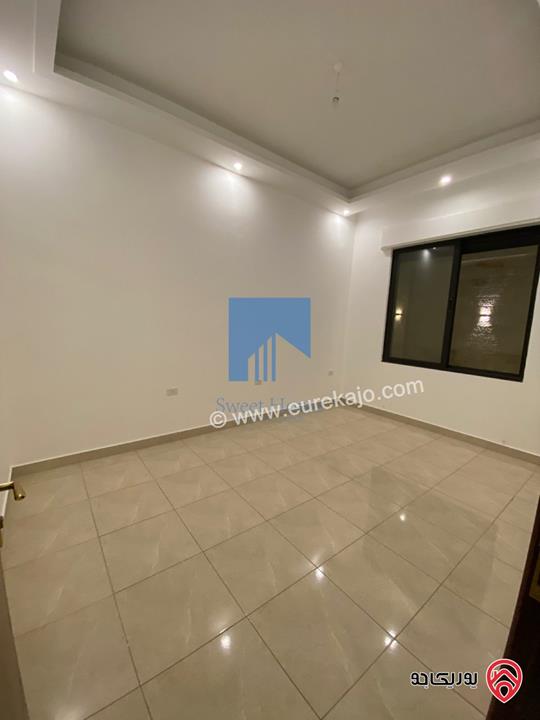 شقة أرضية 210م مع ترسات 170م للبيع في عمان - عرقوب خلدا - قرب خزان ماء (حاووز)