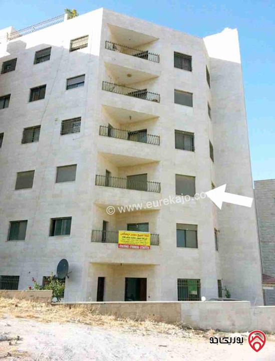  شقة طابقية للبيع في عمان- الجبيهة مساحة 160م ط2 مؤجرة  بدخل سنوي 3000 دينار والمستأجر ملتزم بالسداد  