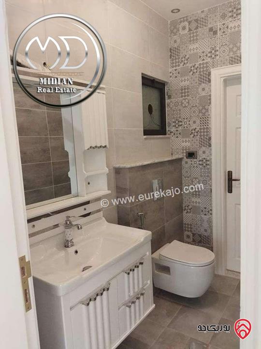 شقة أرضية مفروشة للايجار في عمان - طريق المطار مساحة 180م مع ترس 70م تشطيبات ديكورات فندقية فرش فاخر بسعر مميز