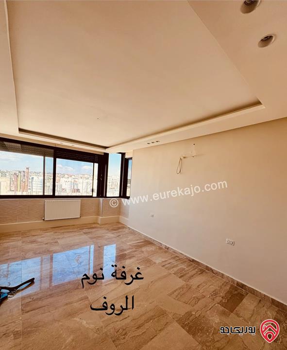 شقة فاخرة طابق ثالث مع روف مساحة 405م للبيع في عمان - خلدا