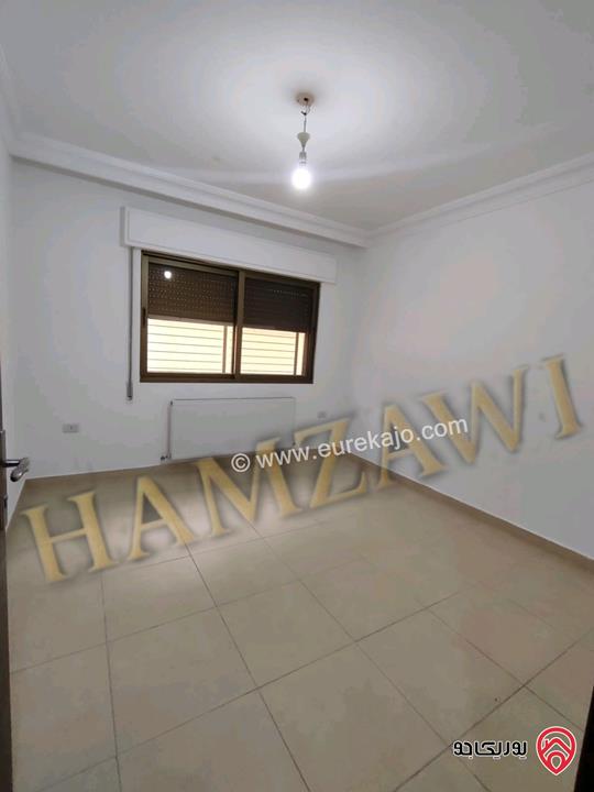 شقة فارغة طابق ارضي مساحة 100م داخلي و 120م خارجي للإيجار في عمان - عبدون 