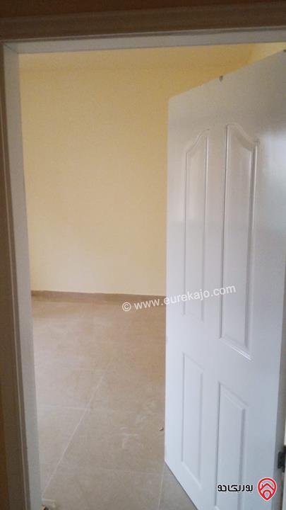 شقة طابق أول مساحة 128م للبيع في عمان - الجبل الأخضر حي نزال الشمالي 