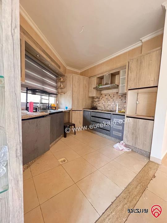 شقة شبه ارضية مساحة 110م للايجار في عمان - خلدا