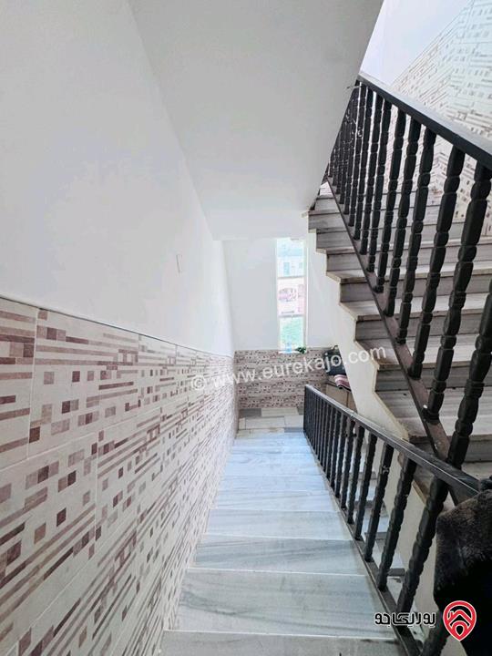 عمارة مكونة من 10 شقق مؤجرة للبيع في مادبا حنينا