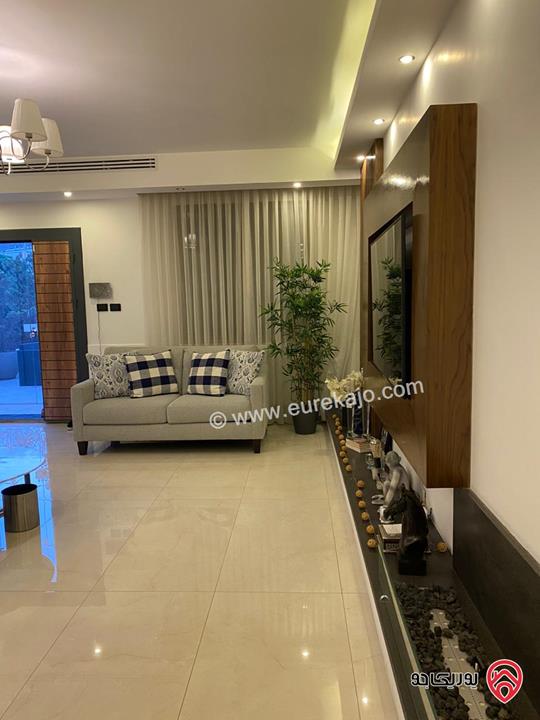 شقة ارضية فاخرة مفروشة مساحة 142م داخلي و 40م خارجي للايجار في عمان - الدوار الرابع جبل عمان