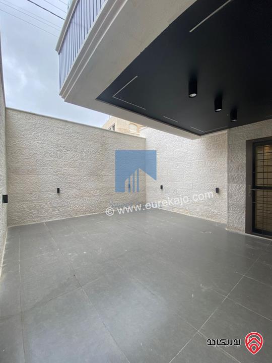 شقة شبه ارضية مساحة 175م مع ترسات 120م للبيع في عمان - الرابية