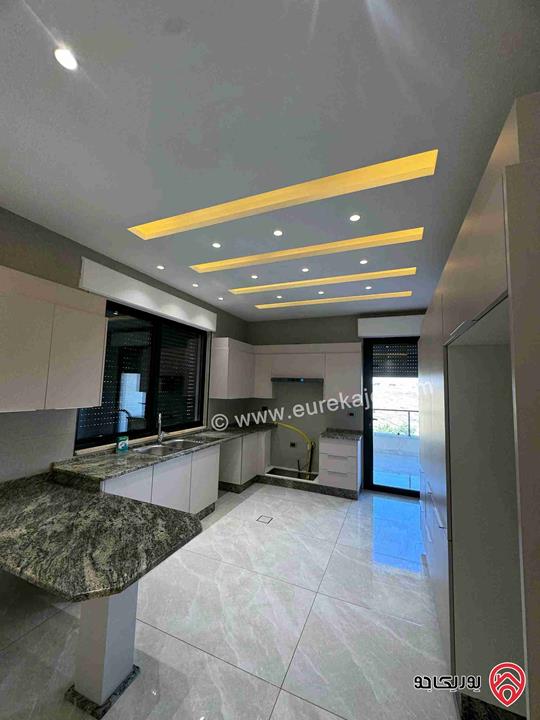 شقة جديدة لم تسكن طابق ثاني مساحة 176متر للإيجار في عمان - مرج الحمام 