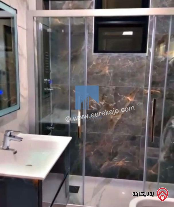 شقة مفروشة طابق ثاني 100م تشطيب سوبر ديلوكس للبيع في عمان - الرابية