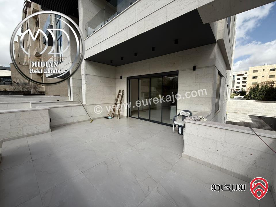 شقة ارضية للبيع في عمان - دير غبار مساحة 185م مع ترس 100م تشطيبات و ديكورات عصرية فاخرة جديدة لم تسكن