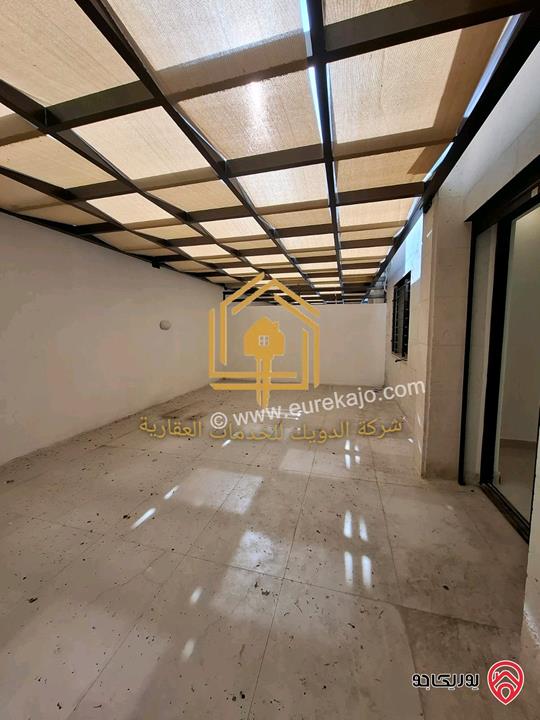 شقة جديدة طابق أرضي مع حديقة مساحه 150م داخلي 130م حديقة للايجار في عمان - الجندويل 