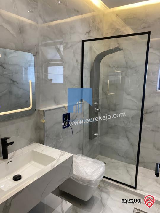 شقة أرضية فاخرة للبيع في عمان - أم أذينة قرب أبراج السادس 200م مع ترس 60م لم تسكن