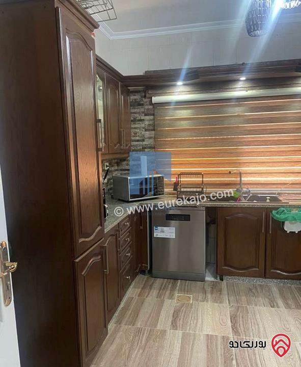 شقة مميزة شبه أرضية مساحة 130م للبيع في عمان - خلدا