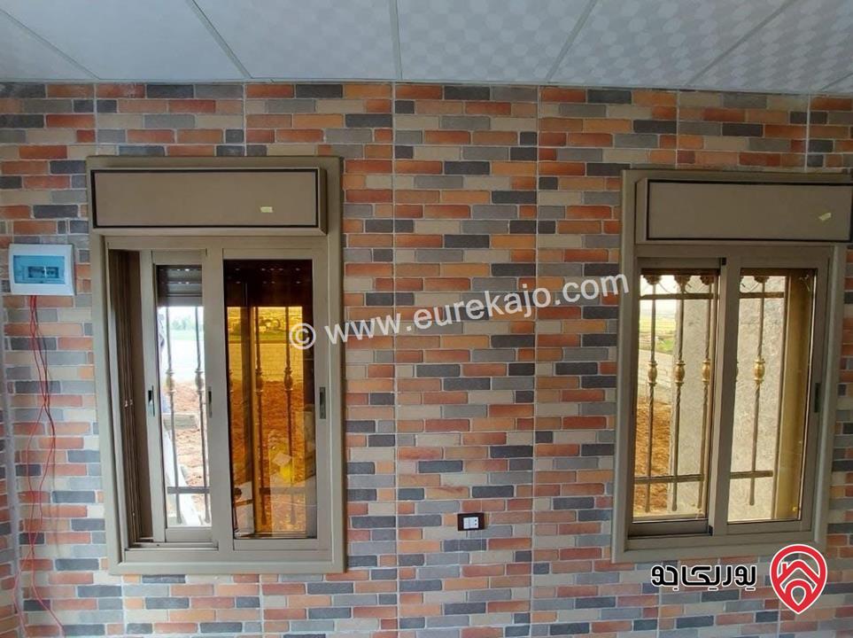 قطعة ارض مساحة 809م وفيها بناء 60م للبيع في عمان - ناعور منطقة السامك