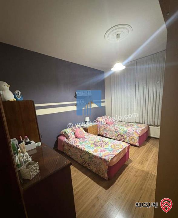 شقة أرضية مساحة 170م مع ترسات 120م للبيع في عمان - الرابية