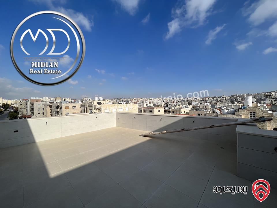 شقة دوبلكس جديدة طابق أخير مع روف للبيع في عمان - الدوار السابع مساحة 200م مع تراسات اطلالة رائعة بسعر مميز