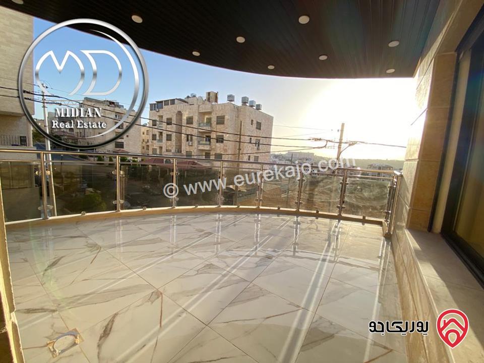 شقة دوبلكس جديدة للبيع في عمان - خلدا العوجانية طابق أخير مع روف مساحة 250م مع تراسات اطلالة رائعة بسعر مميز