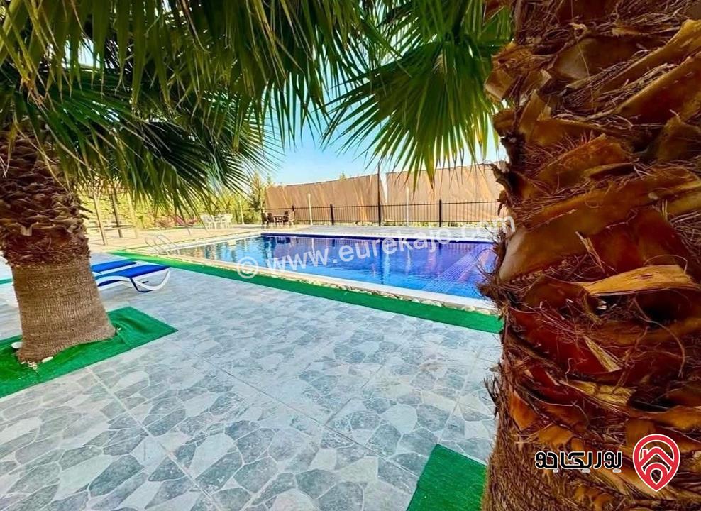 شاليه ومزرعة مساحة الأرض 3 دونم و 404م والبناء 150م للبيع في جرش