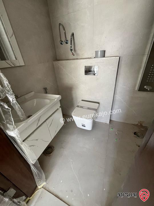 شقة طابق أول مساحة 100م للبيع في عمان - جبل الزهور