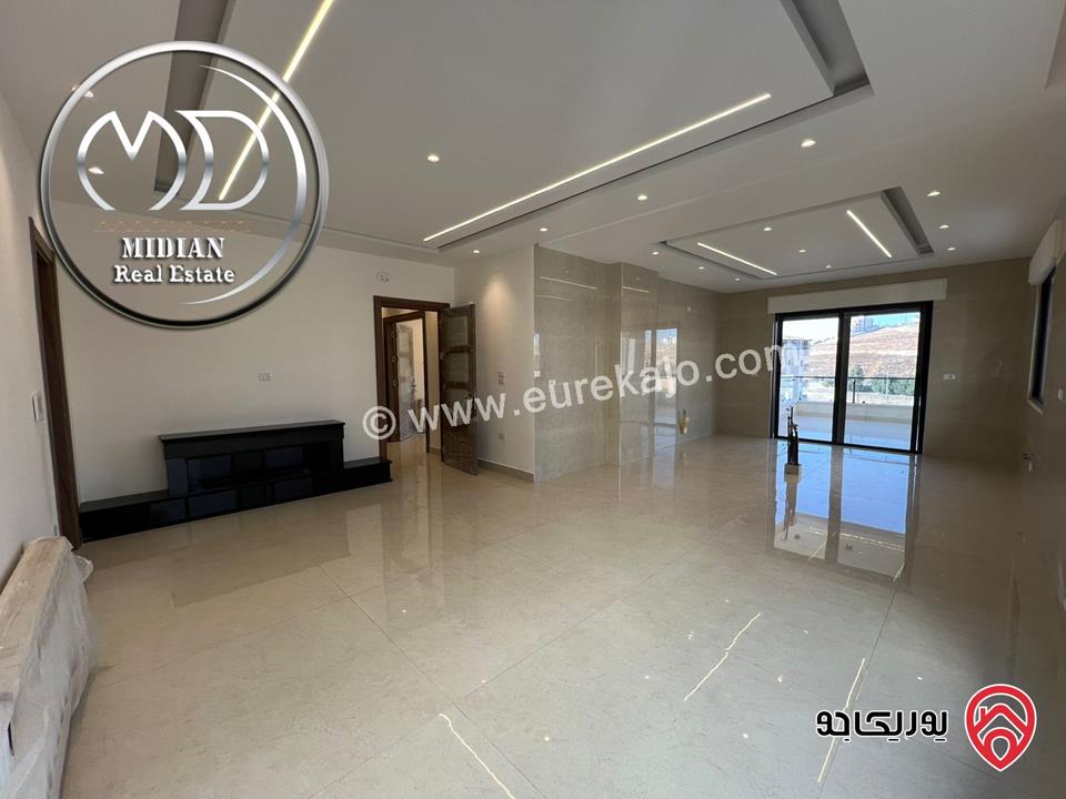 شقق فاخرة للبيع في عمان - ضاحية النخيل مساحات 225م تشطيبات وديكورات عصرية اطلالة جميلة جديدة لم تسكن