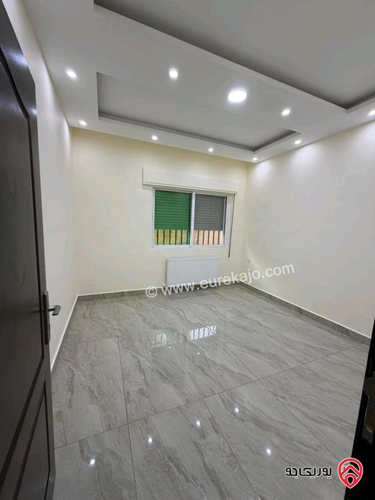 شقة طابق أرضي معلق مساحة 130م للبيع في عمان - ضاحية الرشيد