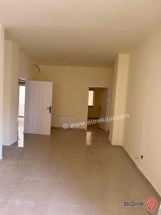 شقة طابق أول مساحة 128م للبيع في عمان - الجبل الأخضر حي نزال الشمالي 