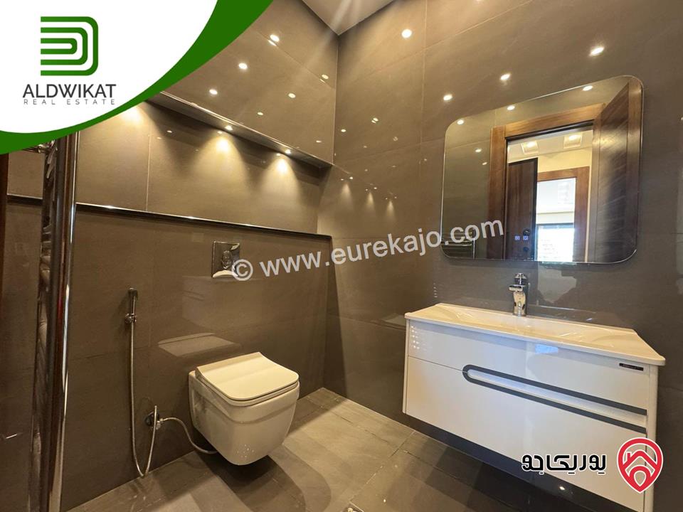 شقة ارضية للبيع في عمان - رجم عميش / طريق المطار مساحة البناء 210م ومساحة الحديقة 200م