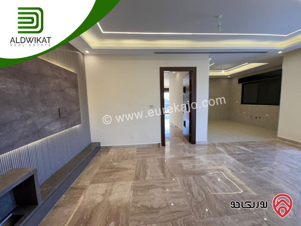 شقة ارضية معلقة للبيع في عمان - خلدا العوجانية المساحة 220م ترس 15م موقع مميز