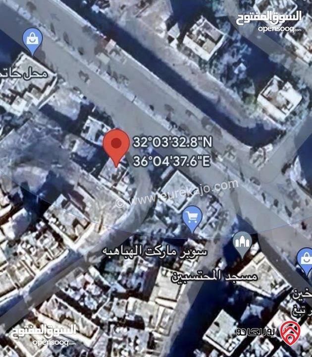 ارض تجارية استثمارية على شارعين مساحة 375م للبيع في الزرقاء - الجبل الابيض 