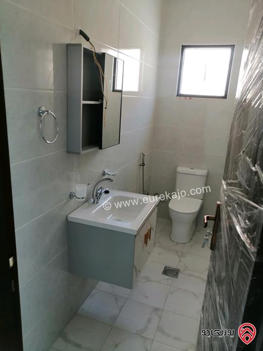 شقة طابق أرضي مساحة 110م للبيع في العقبة - منطقة التاسعة أهالي