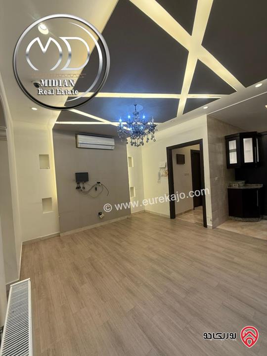 شقة شبه ارضي فاخرة للبيع في عمان - خلدا مساحة 150م مع ترس و حديقة 150م تشطيبات ديكورات عصرية فاخرة بسعر مميز جداً