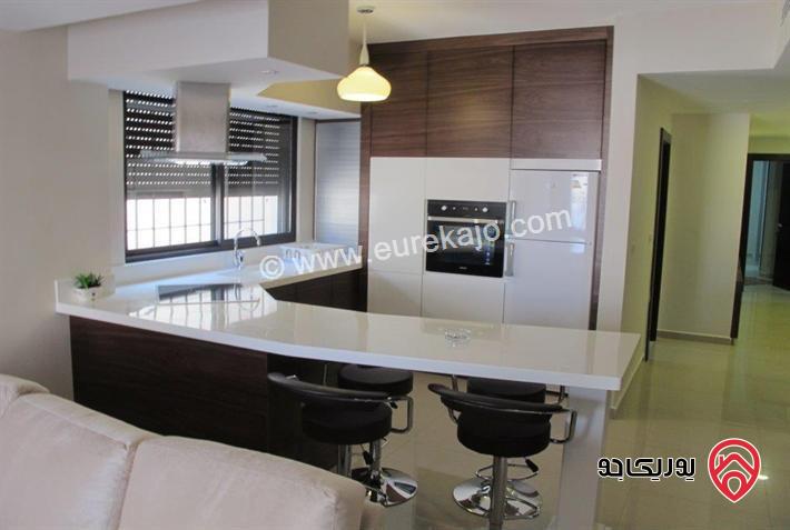 شقة مفروشة فاخرة شبه أرضية مساحة 97م + 100م ترس وكراج خاص للبيع في عمان - الدوار الرابع 