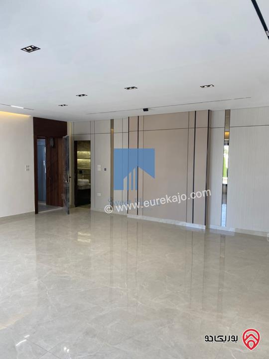 شقة أرضية فاخرة للبيع في عمان - أم أذينة قرب أبراج السادس 200م مع ترس 60م لم تسكن