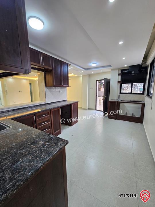 شقة طابق ارضي مساحة 100م للايجار في عمان - تلاع العلي 