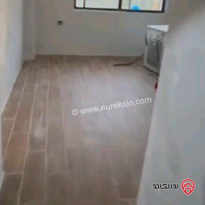 شقة ارضية مساحة 100م مع حديقة 150م وباربكيو وشلال فارغة للايجار في عمان - البنيات