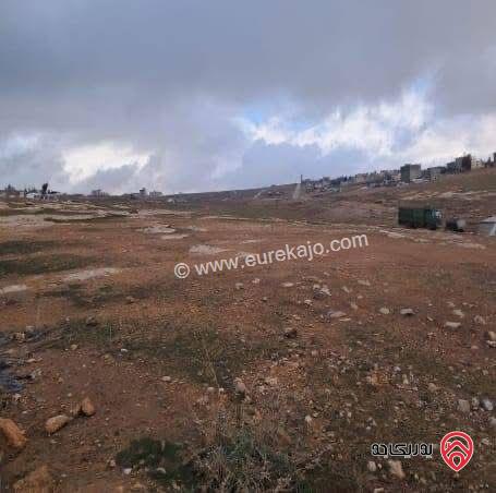 ارض تجارية مساحة 4 دونم و 76م للبيع في الكرك زحوم باتجاه المنشيه