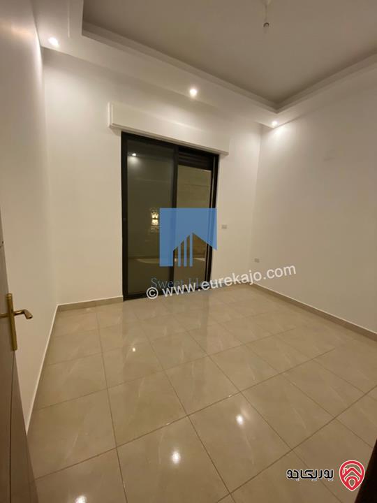 شقة أرضية 210م مع ترسات 170م للبيع في عمان - عرقوب خلدا - قرب خزان ماء (حاووز)