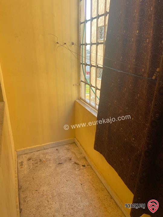 شقة طابق أول مساحة 126م للايجار في اربد شارع القدس